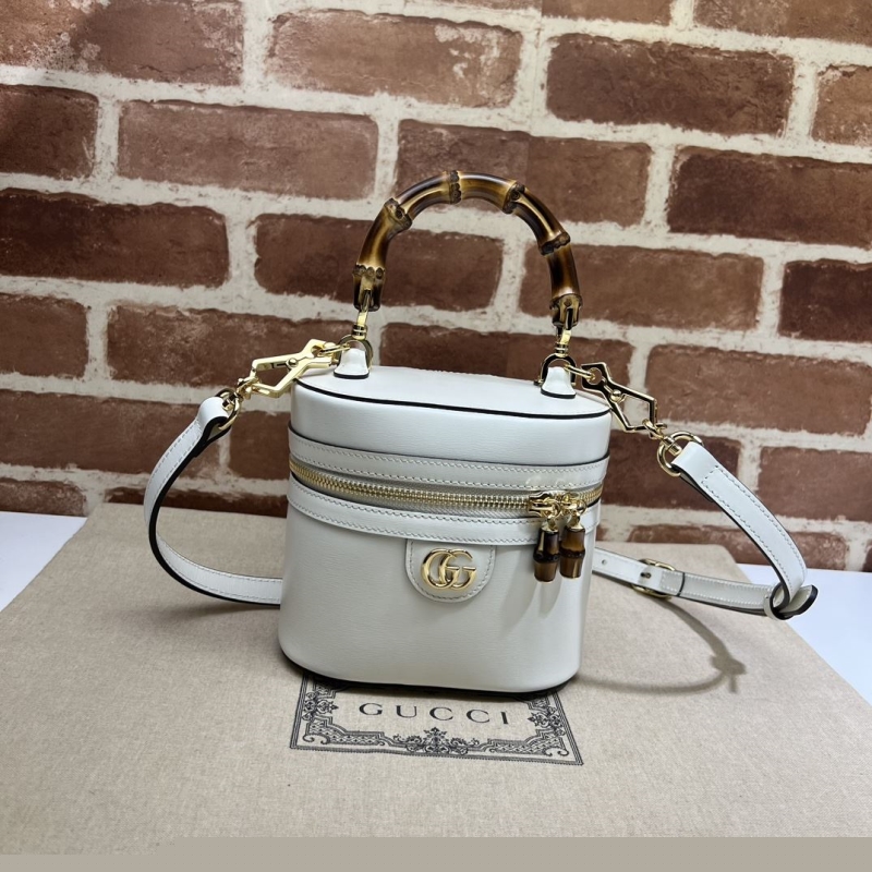 G*u*i cosmetic bags
